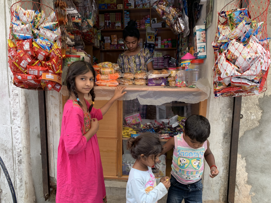 pakistan young girl running shop